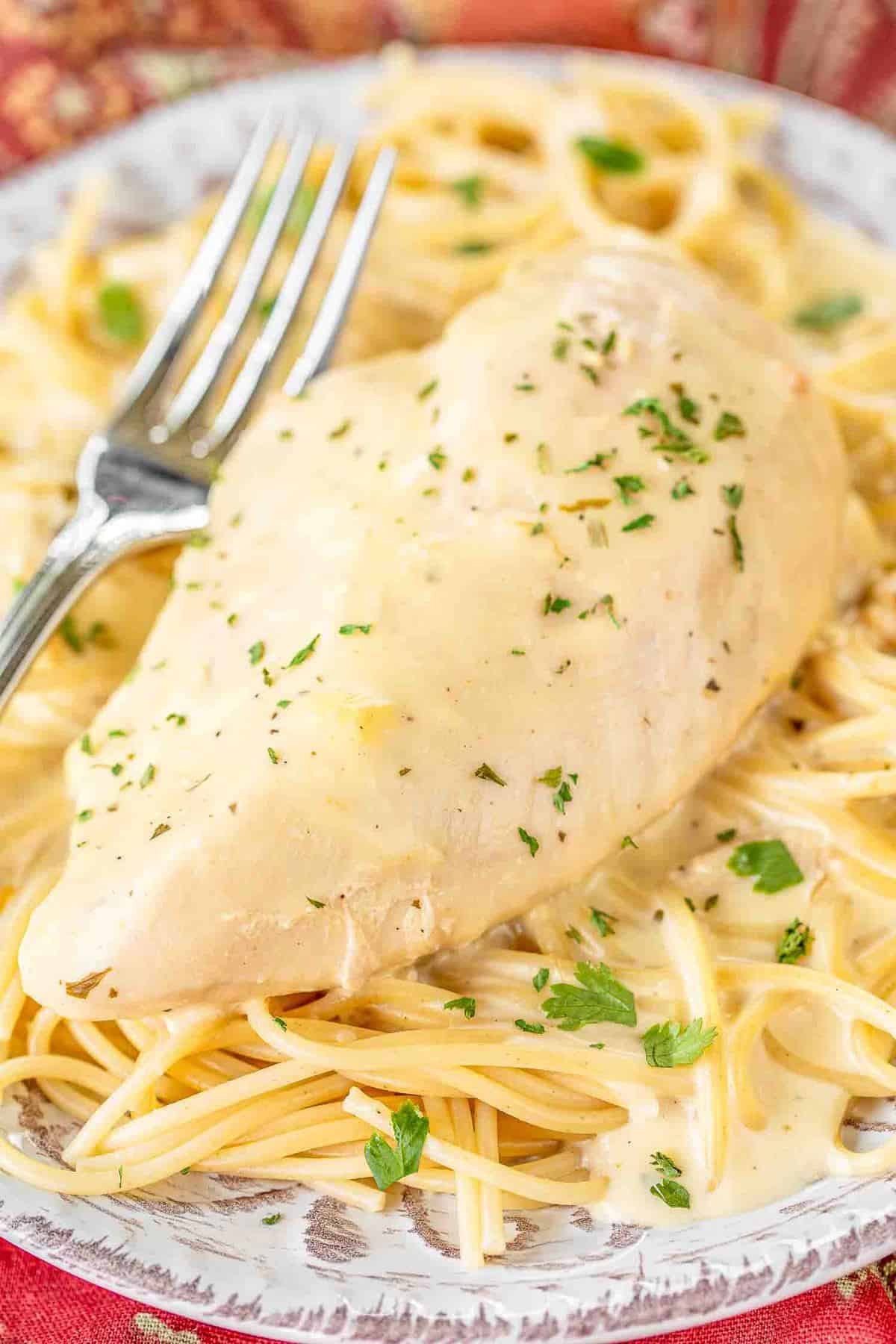 Slow Cooker Ranch Chicken over pasta