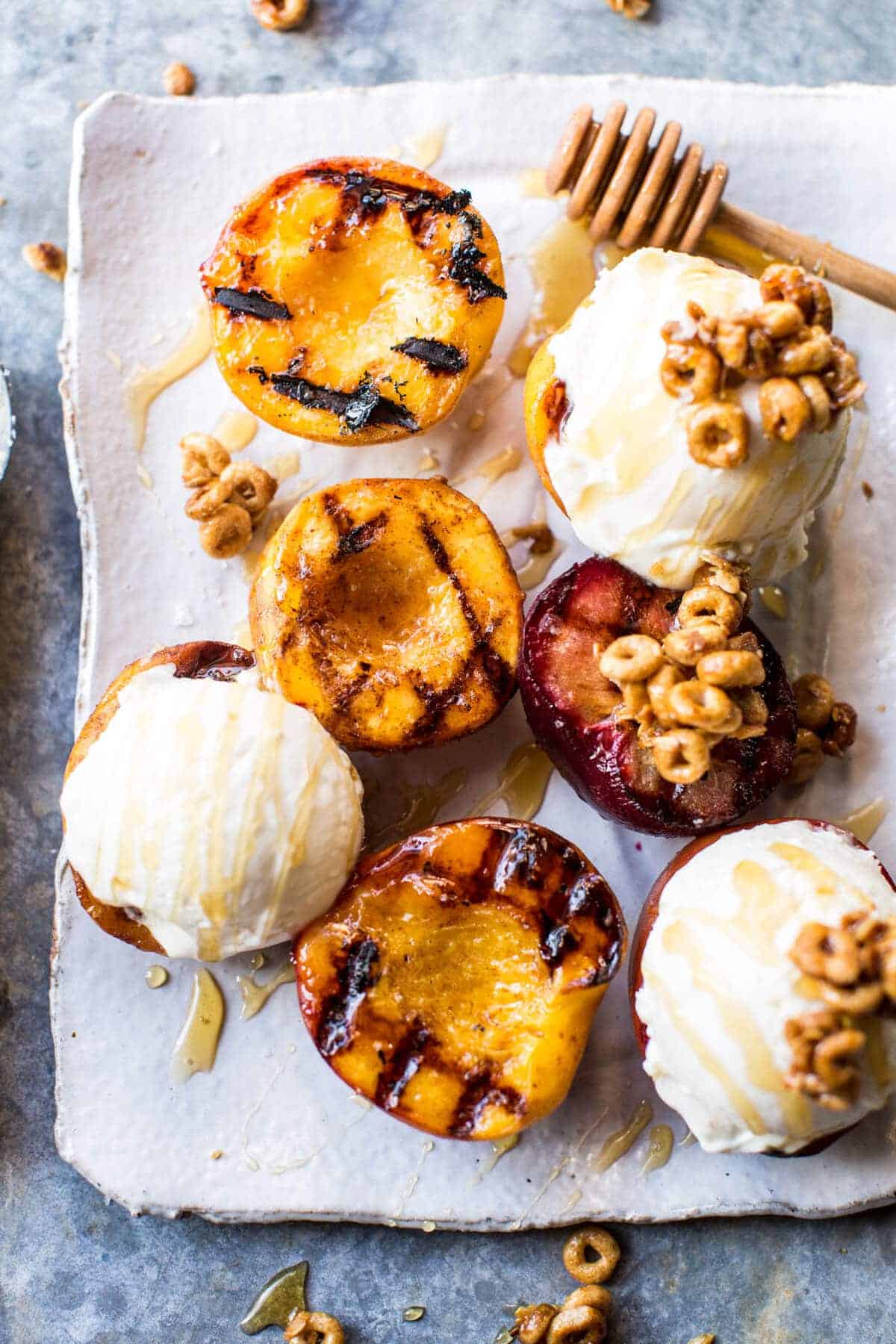 Cinnamon grilled peaches with mascarpone ice cream and granola from Half Baked Harvest
