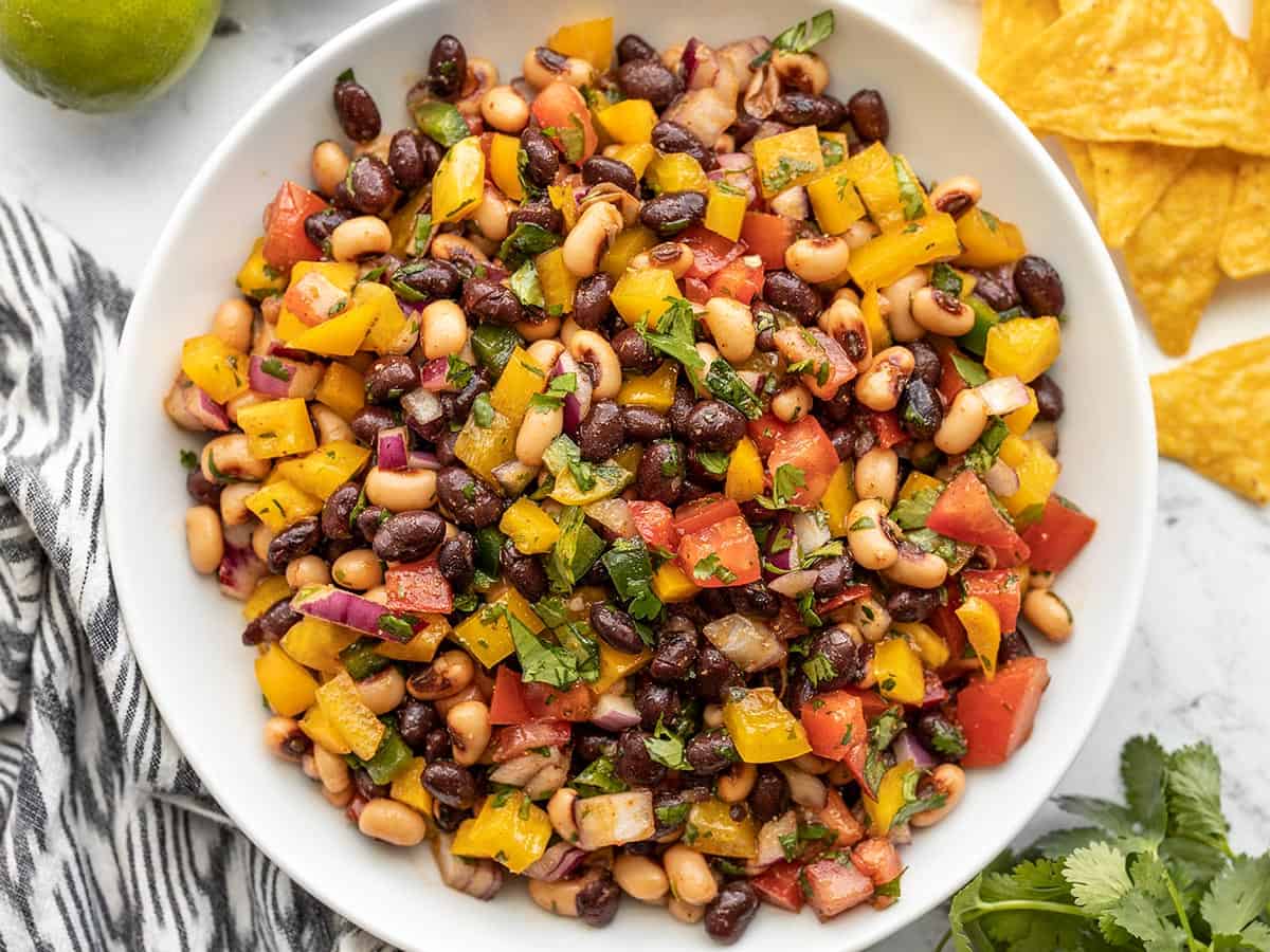 Cowboy caviar with black beans, black eyed peas, corn, bell pepper and cilantro