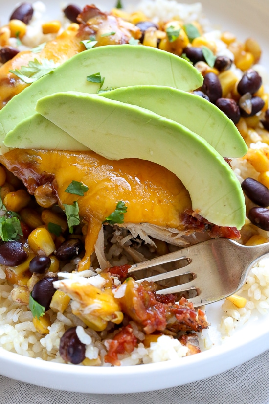 Slow Cooker Salsa Chicken with Black Beans and Corn topped with melted cheese