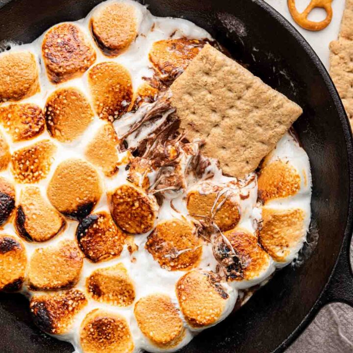 Cast iron s'mores dip with toasted marshmallows and chocolate chips from Dessert for Two