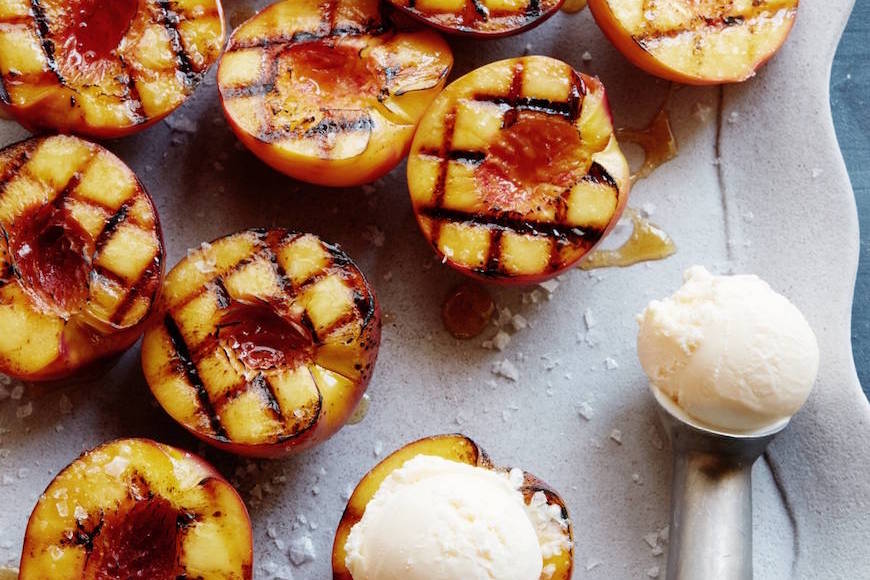 Grilled peaches and nectarines with vanilla ice cream honey and flaky salt