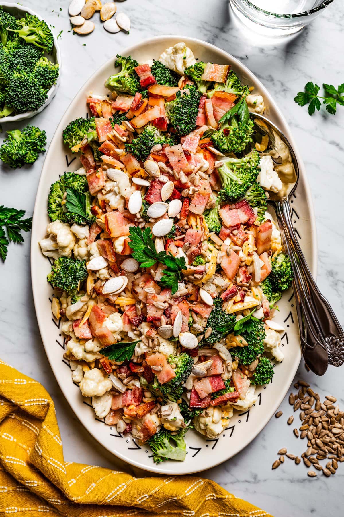 Broccoli cauliflower salad with bacon and cheddar