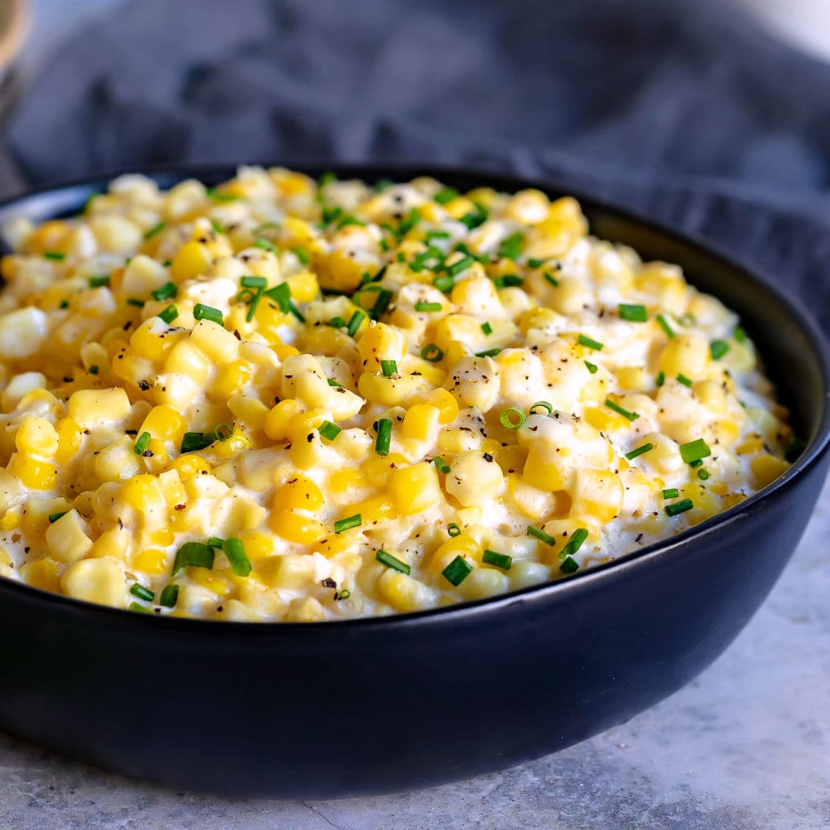Easy creamed corn with frozen corn, cream cheese and butter cooked until thick and creamy
