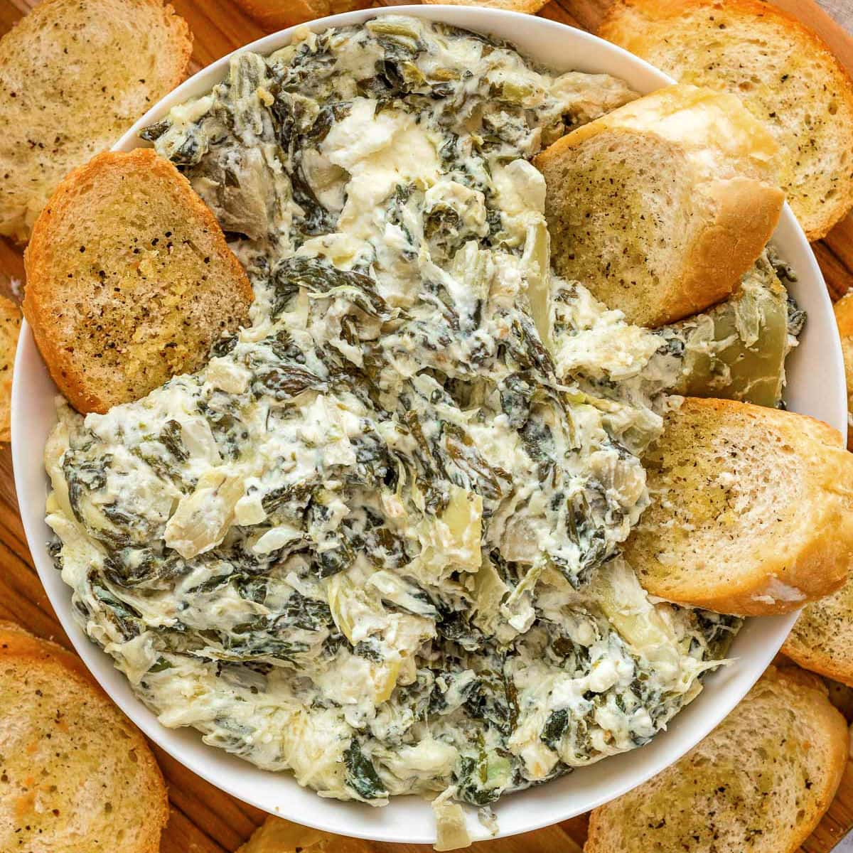 Crockpot Spinach Artichoke Dip cheesy warm with crostini
