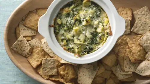 Slow Cooker Hot Artichoke and Spinach Dip with Swiss cheese and baguette
