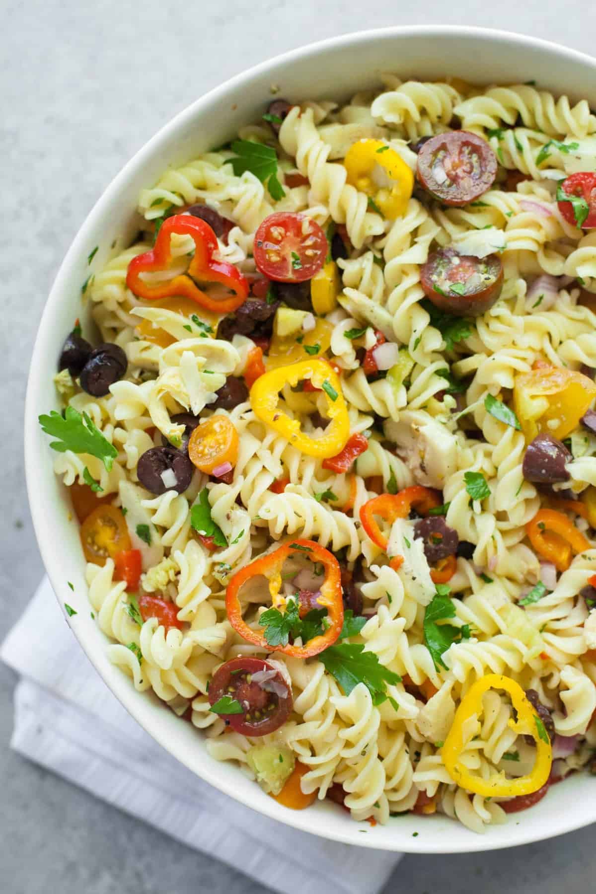 Vegan antipasto pasta salad with olives and artichoke